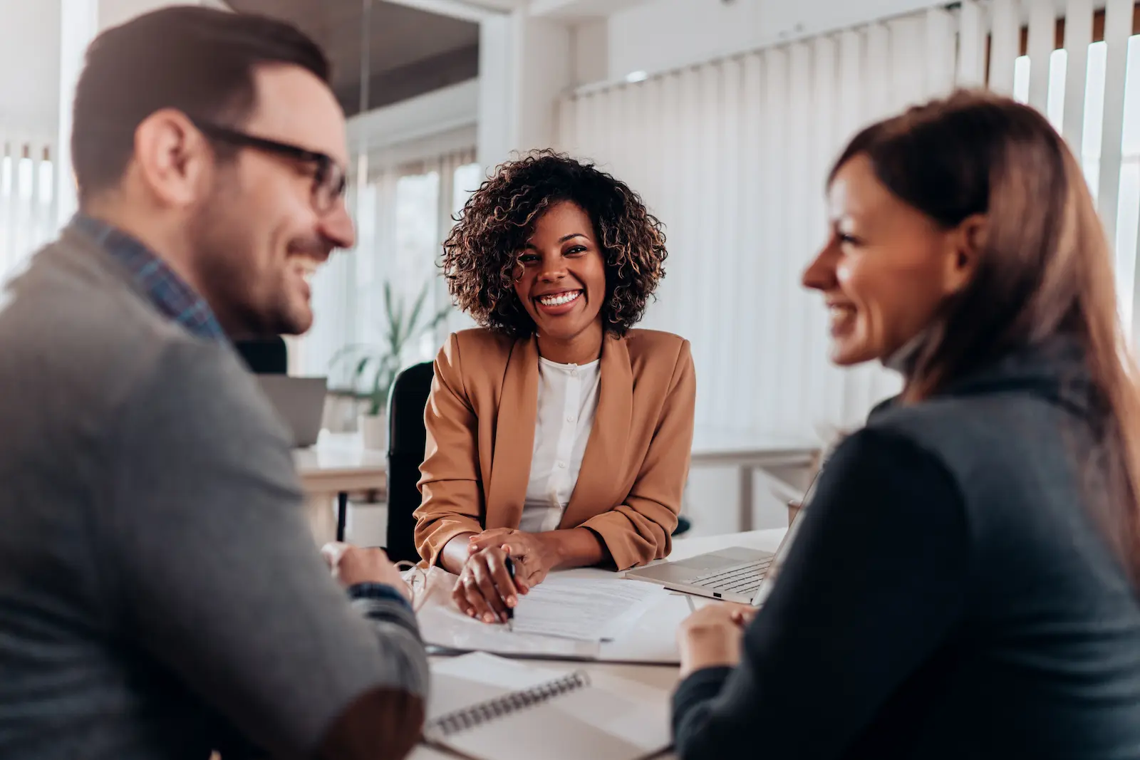 photo of loan officer with clients