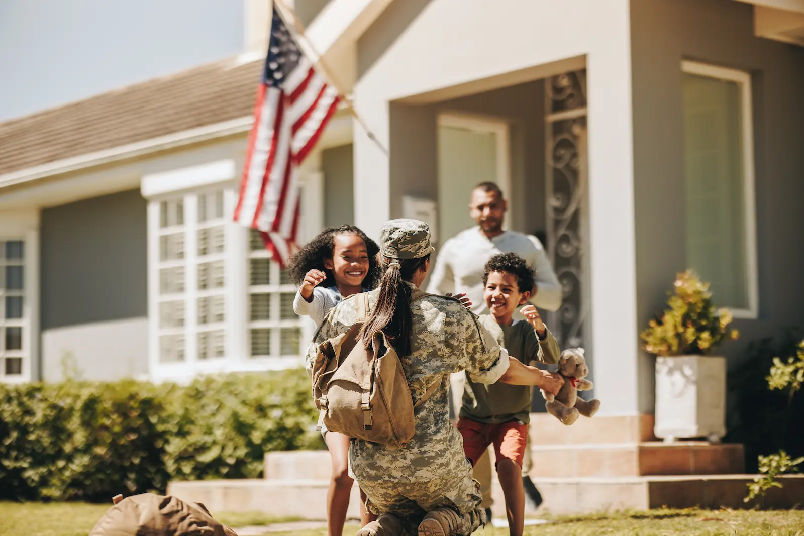 va mortgage loans photo of us veteran welcoming family