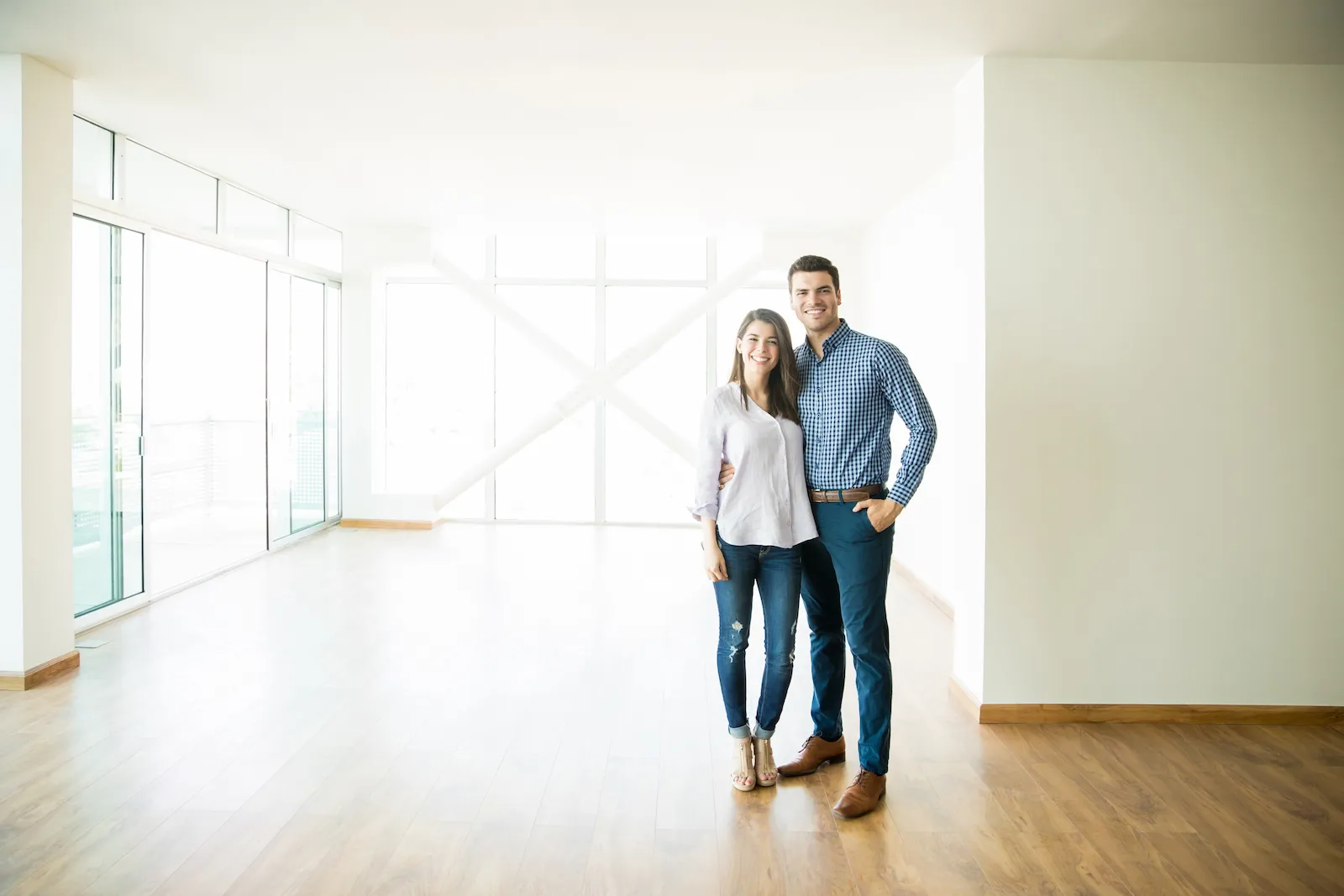 couple standing in new home